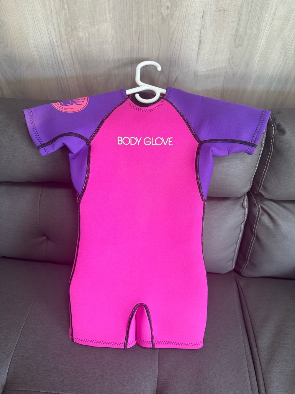 Body Glove Kids Short Sleeve One-Piece Swimsuit in Hot Pink and Purple